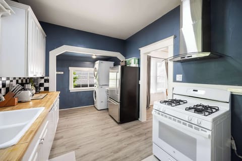 Stylish kitchen with modern appliances and a cozy layout, perfect for cooking meals during your stay.
