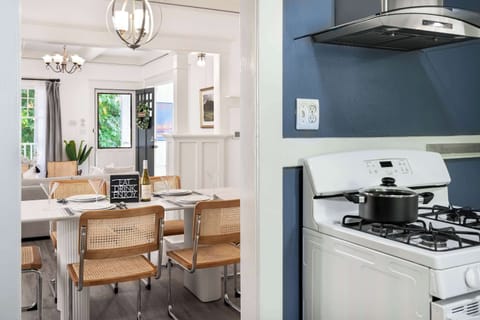 View from the kitchen into the dining and living area, creating a seamless flow for family gatherings.