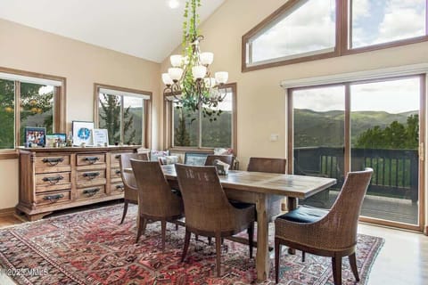 Dining space between kitchen and living room