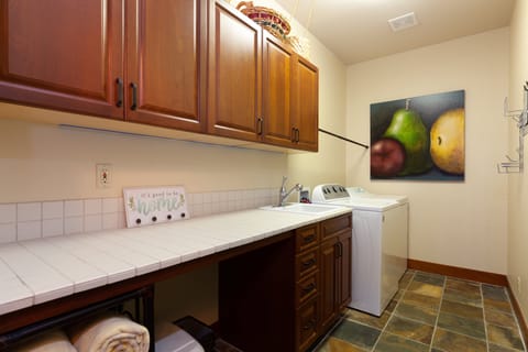 In home laundry with detergent and supplies provided