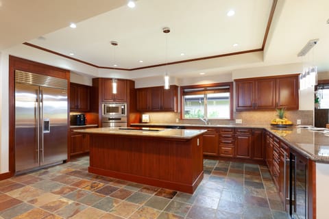 Spacious gourmet kitchen for prepping delicious island inspired meals