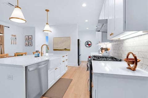 Whip up culinary masterpieces in the sleek, fully equipped kitchen