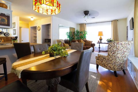 Gather for elegant meals together at the dining table, seating 4