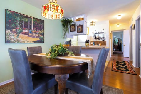 Gather for elegant meals together at the dining table, seating 4
