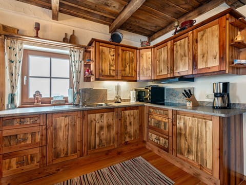 Wood, Kitchen, Cabinetry, Furniture, Countertop, Home, Wood Stain, Cupboard, Ceiling, Hardwood