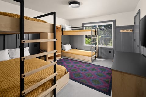 Unit with Four Bunk Beds. Exact unit will be assigned upon arrival. Views, colors, and decor may vary.
