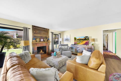 Family room with fireplace and dining area