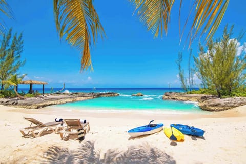 On the beach, sun loungers, beach towels