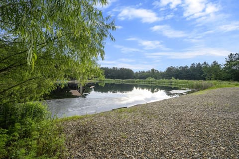 Relax by the pond stocked with bass and crappie for fishing. Enjoy kayaking or paddle boating along the scenic 2-mile stretch
