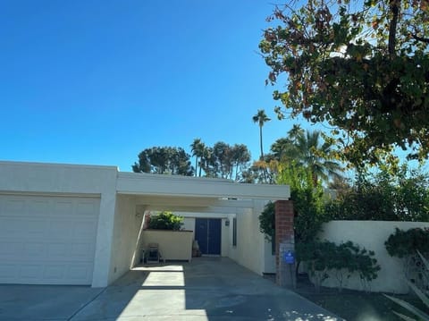 Front of house; attached garage can also store an additional car