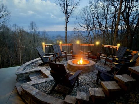 Imagine ending your day gathered around a crackling fire, sharing stories and laughter with loved ones. Our fire pit area offers the perfect blend of warmth, ambiance, and scenic views, creating unforgettable moments during your stay at Roberts Drive