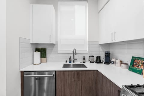 Full sized dishwasher and gas stovetop 