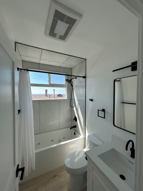 Shower, jetted tub, hair dryer, towels