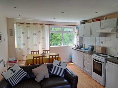 Lounge with dining area/kitchen: view towards rear windows