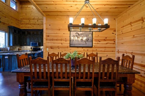 [Main level: Dining] Table seats 10 plus 8 islands barstools