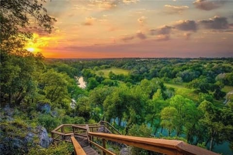 View from patio deck. Can see river below.