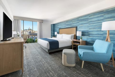 Lounge comfortably in a stylish room with extra seating.