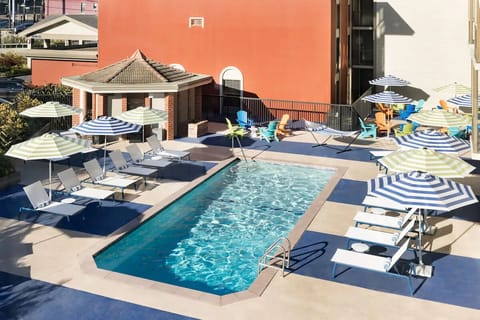 Recharge with an overhead view of lively poolside seating.
