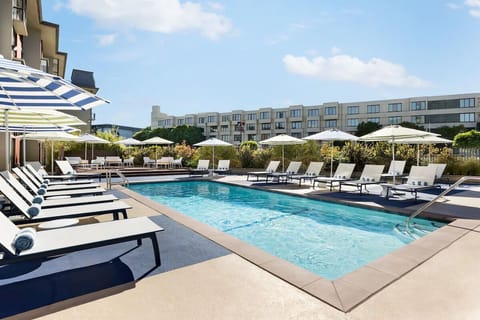 Soak up sunshine with a full view of the sparkling pool.