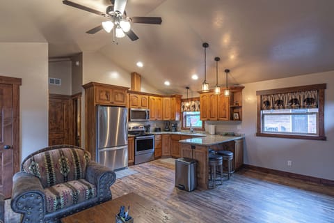 Fridge, stovetop, dishwasher, coffee/tea maker