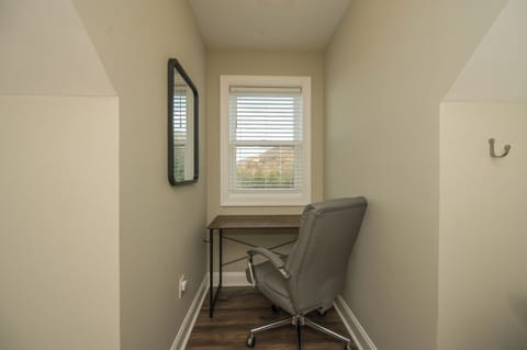 Desk and chair in dormer (In 2 of the 3 upstairs rooms)