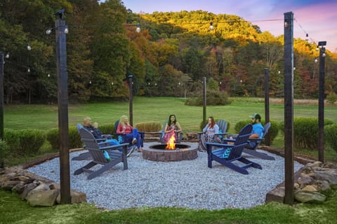Enjoy stargazing or cozy nights around the firepit, surrounded by lush greenery.