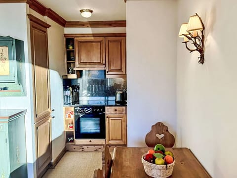 Property, Cabinetry, Countertop, Wood, Interior Design, Home Appliance, Kitchen Appliance, Kitchen, Kitchen Stove, Floor