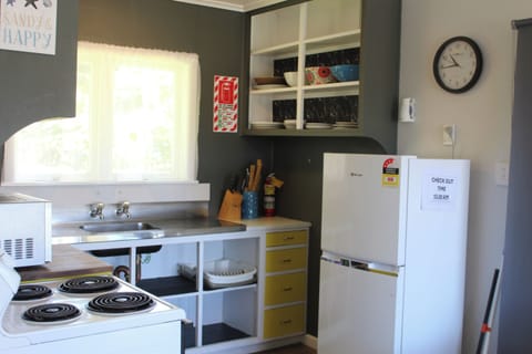 Fridge, microwave, toaster, cookware/dishes/utensils