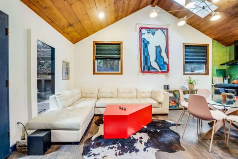 Sink into the luxurious leather sectional and take in the artistic details that make the Eclectic Escape unforgettable.