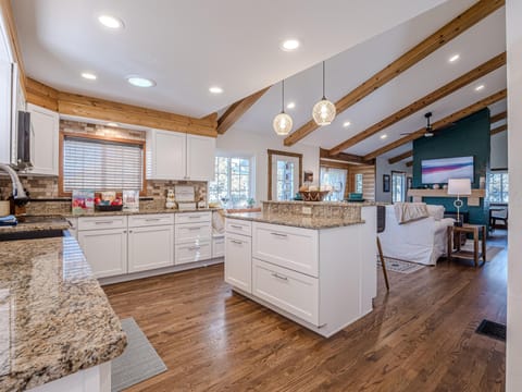 A spacious, fully equipped kitchen awaits, making meal prep a delight and every dish a masterpiece.