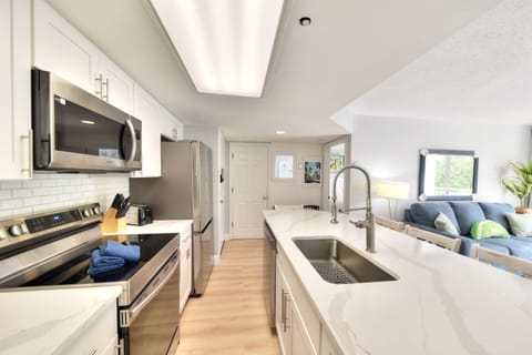 Step into comfort with our beautifully renovated kitchen, featuring all-new appliances—perfect for cooking up a fresh breakfast before enjoying the outdoor picnic and grilling area.