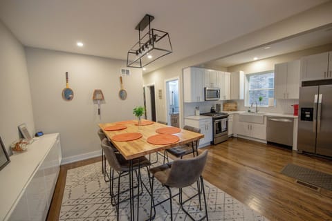 Dining table sits 6 people comfortably