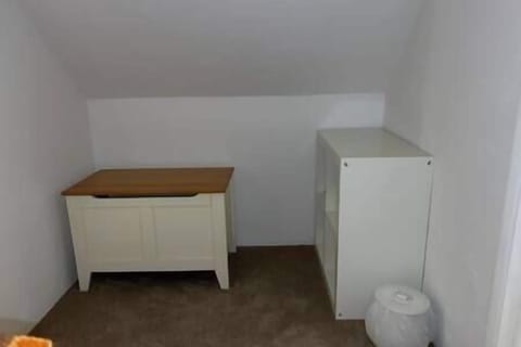 Toy box and area between the two twin rooms upstairs