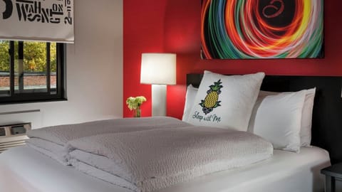 Unit with 1 Queen bed. Exact unit will be assigned upon arrival. Views, colors, and decor may vary.