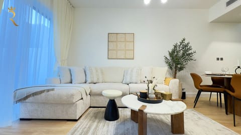 Step into luxury in our spacious living room, complete with elegant decor and plush seating—perfect for unwinding after a day of exploring!