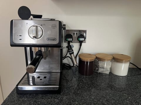 Kitchen / Coffee Machine with supplied coffe, sugar and tea bags.