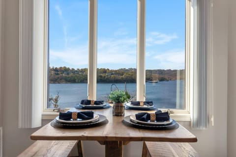 Gather for meals together with a lake view at the dining table, seating 4