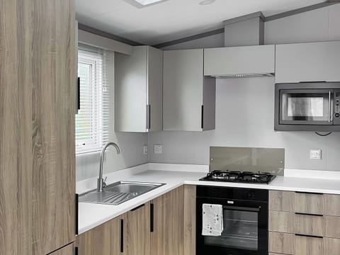 Open plan living space | Katie’s Cosy Caravan - Shepherds Holidays, Kilmallieu