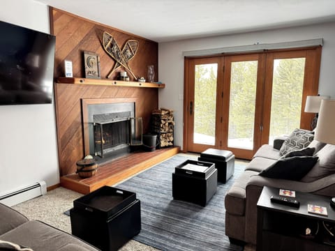 Ground level, trails off the deck w/ a view of Peak 1 and the National Forest 