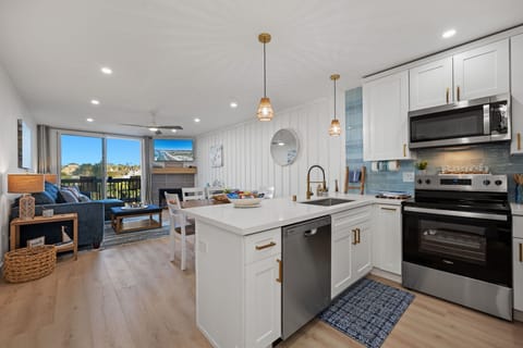 Fully stocked kitchen with essential cooking tools including an air fryer