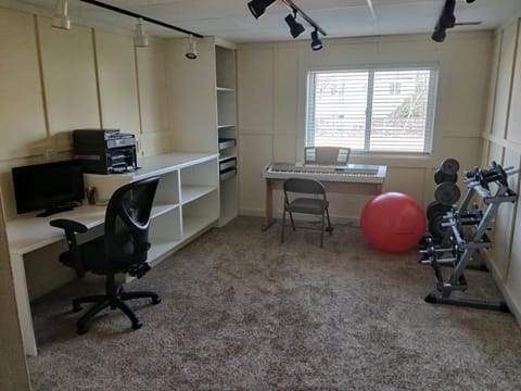 Dedicated work and workout space.