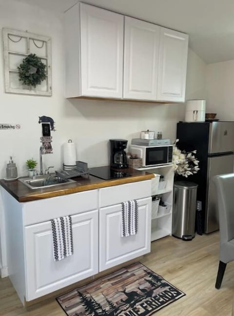 Fridge, microwave, stovetop, coffee/tea maker