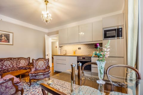 Living room with kitchen and dining table