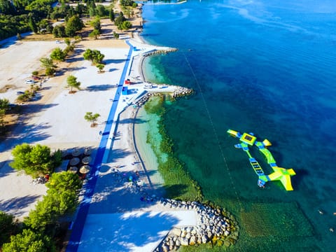 Beach nearby, sun loungers