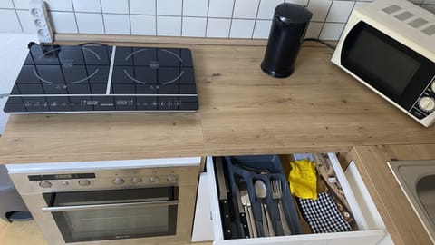 Fridge, microwave, cookware/dishes/utensils