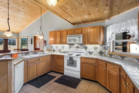 Kitchen - Our fully equipped kitchen with lots of counter space is ideal for cooking for family and friends.