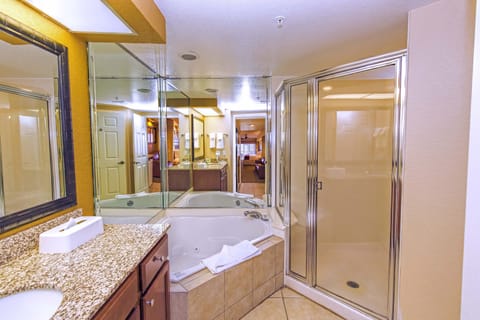 Shower, jetted tub, towels