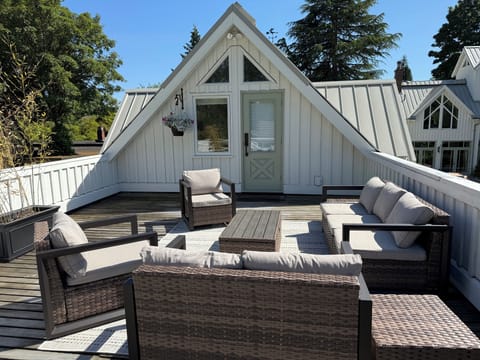 View of private patio and entrance to Le Petit Belle Chasse. 