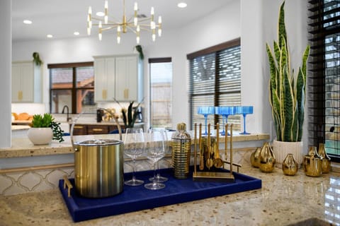 Toast to moments well-spent! Find ice buckets and wine glasses ready for your enjoyment.