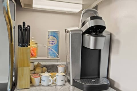 Coffee maker available for your convenience, perfect for brewing a fresh cup to start your day.